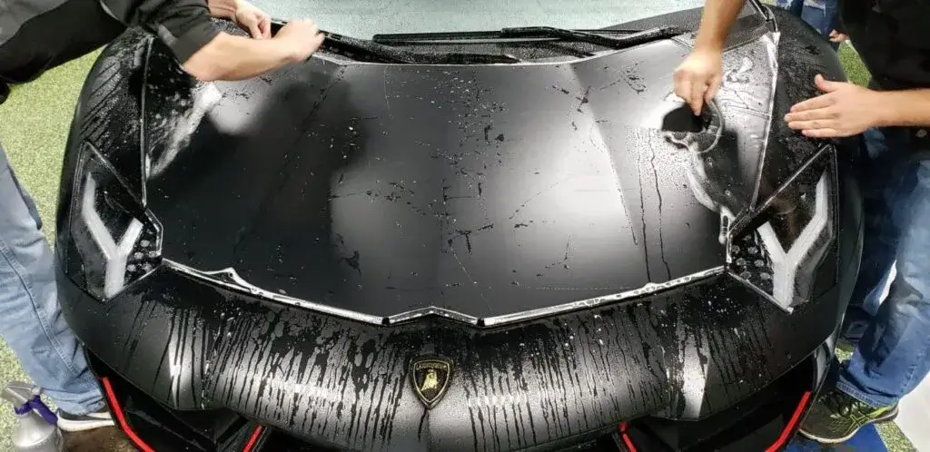 Lamborghini being wrapped in paint protection film